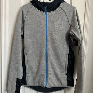Under armor sports zip up jacket with different patterns and textures